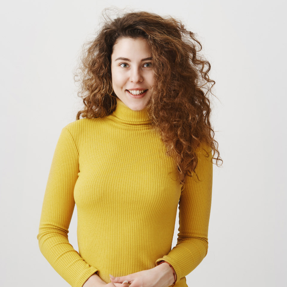 portrait-of-beautiful-cheerful-redhead-girl-with-c-5W46N66.jpg